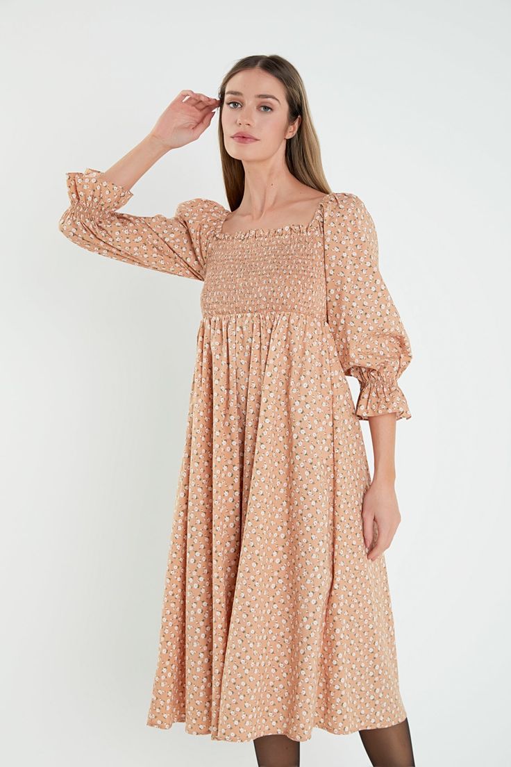 This English Factory dress is a wardrobe staple. With a stylish floral print on a figure-hugging silhouette, this midi dress is perfect for any outing. The smocked bodice is flattering and feminine, while the off-shoulder neckline makes it versatile enough to wear on any occasion. Smocked bodice The elastic neckline can be worn on or off-shoulder Midi length Floral print Hand wash cold Do not bleach Do not tumble dry Iron low Shell: 70% Cotton 27% Nylon 3% Spandex Lining: 100% Rayon Exclusive of Embroidery Sweater, Hugging Silhouette, English Factory, Floral Print Design, Heart Sweater, Pattern Sweater, Mini Dress With Sleeves, Formal Occasion, Midi Length