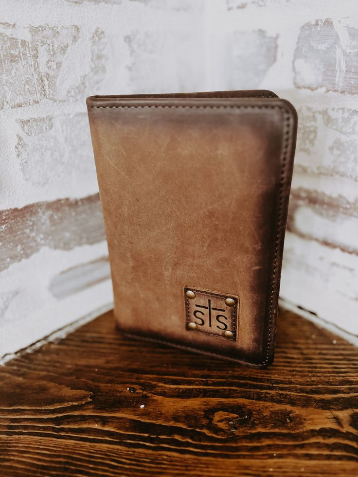 Elevate your everyday look with this dark brown, leather magnetic wallet. Featuring a strong magnetic closure, it's perfect to keep your cards and cash safe. . Stay stylish and organize with this leather wallet. STS Ranchwear Brown Wallets With Rfid Blocking For Everyday Carry, Brown Rfid Blocking Wallets For Everyday Carry, Brown Rfid Blocking Wallet For Everyday Carry, Brown Leather Wallet With Rfid Blocking, Brown Travel Wallets With Magnetic Closure, Brown Bifold Wallet With Leather Patch, Brown Bifold Wallet For Everyday Use, Brown Leather Trifold Wallet For Everyday, Brown Trifold Wallet With Rfid Blocking For Everyday Carry