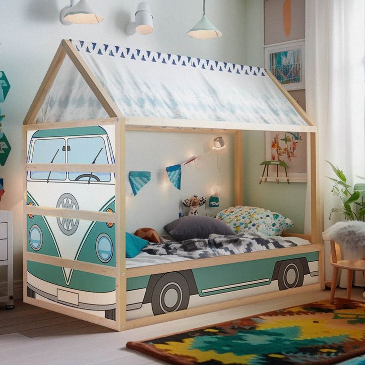 a child's bed with a camper van theme