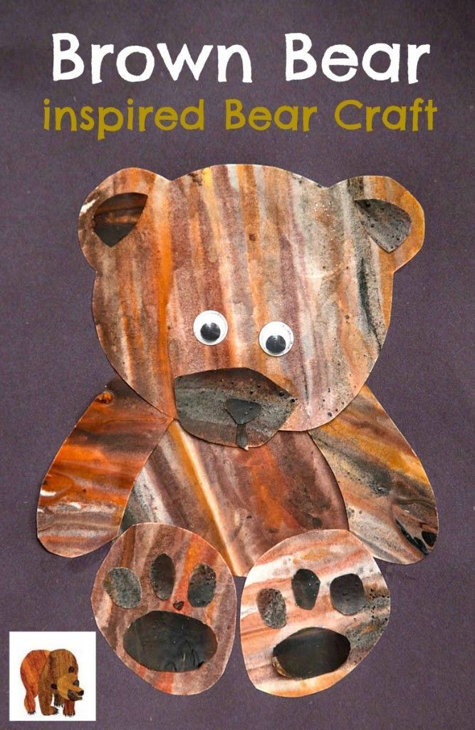 a brown bear made out of wood sitting on top of a purple background with the words, brown bear inspired bear craft