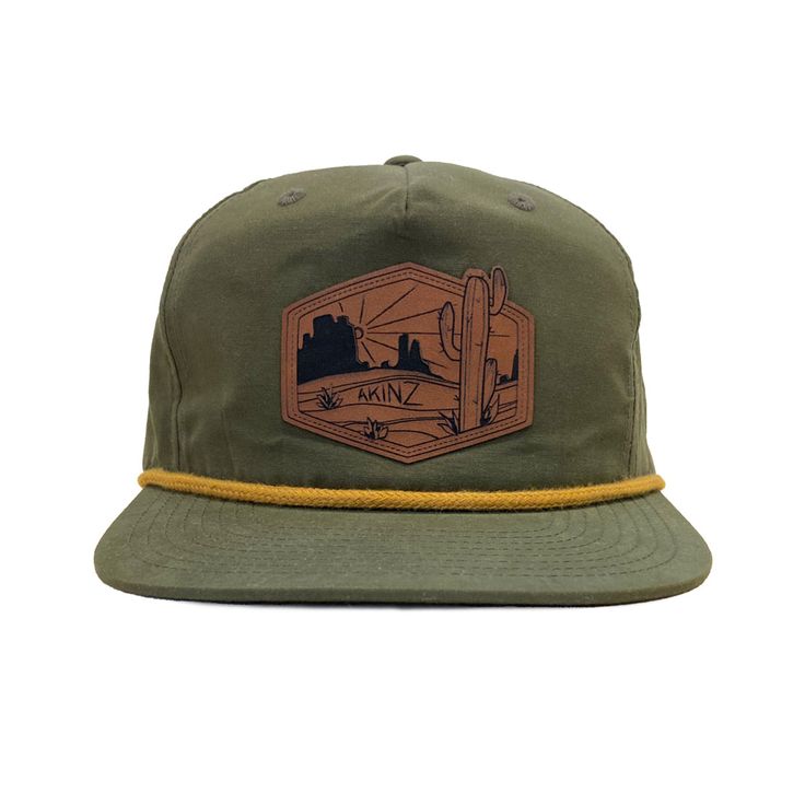 Need a new fun hat for all your day to day adventures?! We got you covered. This super comfy, lightweight five panel rope hat will be your best friend this summer. This design was created by Akinz owner and founder Suzanne Akin. Part of our "Choose Your Adventure" t-shirt and hat collection. Engraved faux-leather patch on an olive green 5-panel nylon hat with golden mustard yellow rope. Green 5-panel Snapback Hat For Beach, 5-panel Adjustable Snapback Hat For Camping, Adjustable 5-panel Snapback Hat For Camping, Green Snapback Hat For Travel, Flat Brim Snapback Hat For Camping, Adjustable Snapback Hat For Camping With Flat Bill, Adjustable Snapback Hat For Camping, Adjustable Green 5-panel Trucker Hat, Adjustable Green Hats For Outdoor