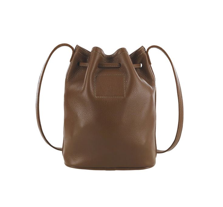 When it comes to a cool carry-all for just the essentials that's perfect on the go, it doesn't get much better than this bucket bag. Gracie features a rich, full-grain, unlined leather body, and leather drawstring strap for long lasting, laid-back style. Comfortable to wear over the shoulder or across the body, keeping your essentials close at hand and easily accessible.
Handcrafted in the U.S.A. (7.00"W, 8.50"H, 3.25"D) Trendy Soft Leather Bucket Bag For Travel, Leather Lined Bucket Bag For Travel In Fall, Fall Leather Bucket Bag, Fall Bucket Bag With Leather Lining For Daily Use, Trendy Leather Travel Bucket Bag, Soft Leather Bucket Backpack For Daily Use, Trendy Leather Bucket Bag For Travel, Chic Brown Duffle Bag For Daily Use, Trendy Leather Bucket Bag