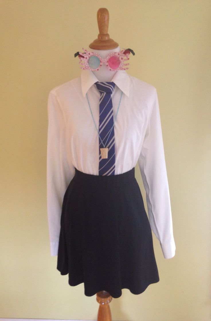 a mannequin wearing a skirt and shirt with a tie on it's neck