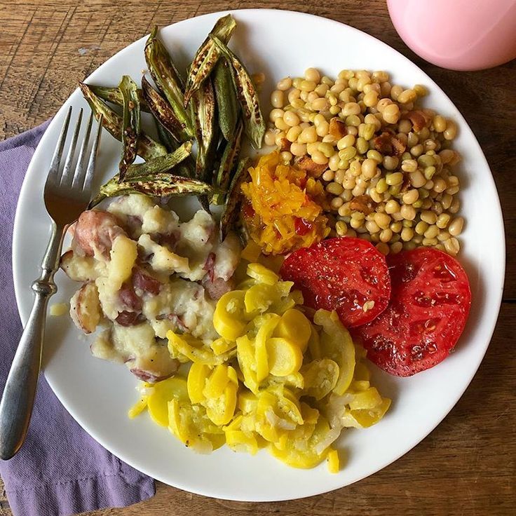 a white plate topped with different types of food