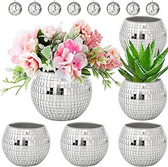 silver disco ball vases with pink flowers and succulents in each one