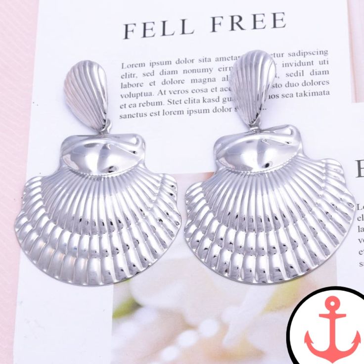 Big Metal Shell Earrings: Perfect for the Passionate Sea Lover Introducing our stunning Big Metal Shell Earrings, the perfect accessory for anyone who has a deep love for the sea and its enchanting symbols. These earrings are part of our popular Shell Earrings collection, where you can find a wide variety of nautical-themed earrings that will make you feel like you're always close to the ocean. Whether you're attending a beachside party or simply want to add a touch of the sea to your everyday s Metal Drop, Sea Lover, Wedding Party Jewelry, Womens Jewelry, Deep Love, Shell Earrings, Party Jewelry, Earrings Collection, Nautical Theme