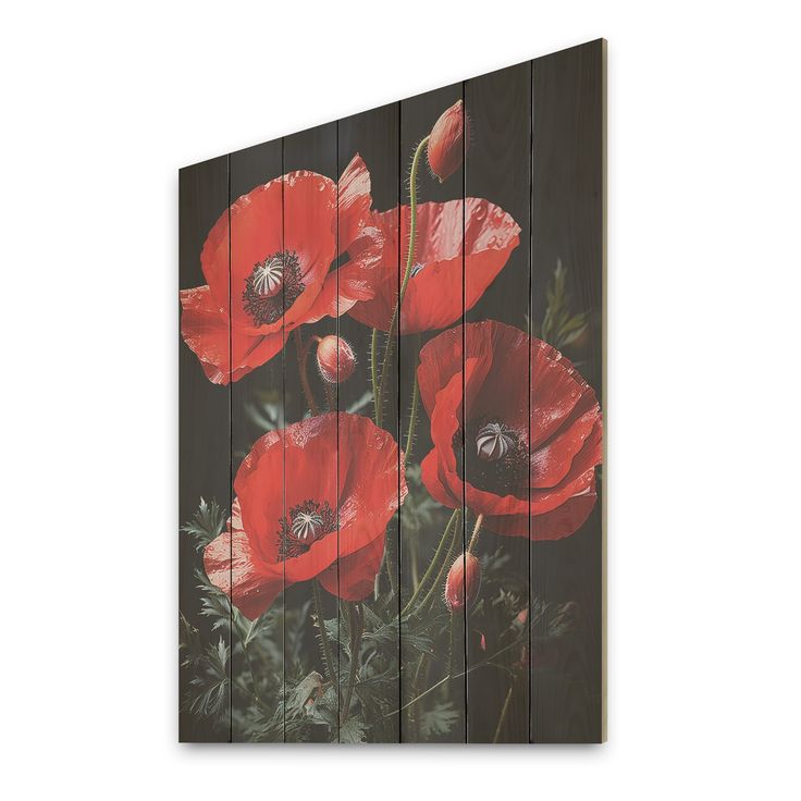 three wooden panels with red flowers painted on them