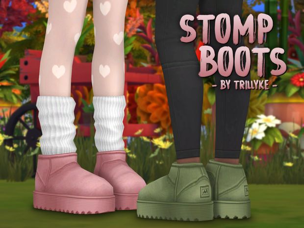 the legs and feet of a woman in pink boots with hearts on them, standing next to a flower garden