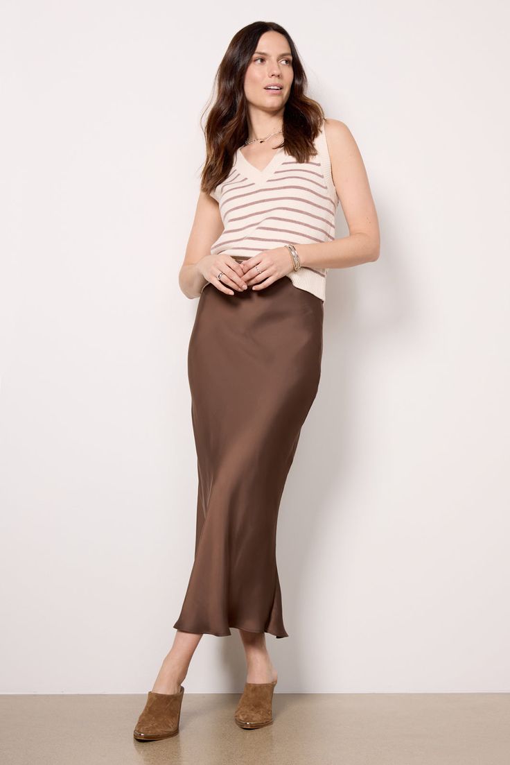 Crafted in sleek satin fabric, the Maddie skirt by EVEREVE is a chic day-to-night staple, featuring a midi silhouette with a hidden elastic waistband. You'll love it paired with everything from a sweater and flats to a fitted tank and heels. | EVEREVE Women's Maddie Satin Skirt, Size Large, Brown Brown Satin, Slip Skirt, Capsule Outfits, Satin Skirt, Long Skirt, Satin Fabric, Sleek, Satin, Fabric