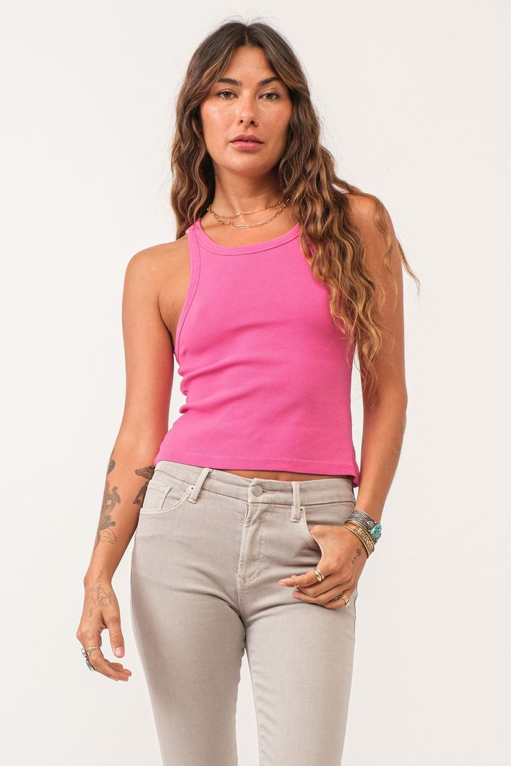 image of a female model wearing a TAMIA CROPPED RACER TANK PINK FLASH DEAR JOHN DENIM Pink Crew Neck Tank Top For Spring, Spring Pink Crew Neck Tank Top, Sporty Solid Color Tank Top For Spring, Sporty Ribbed Crew Neck Tank Top, Pink Cotton Racerback Tank Top, Pink Crew Neck Tank Top For Summer, Spring Casual Racerback Crop Top, Pink Fitted Crew Neck Tank Top, Casual Racerback Crop Top For Spring