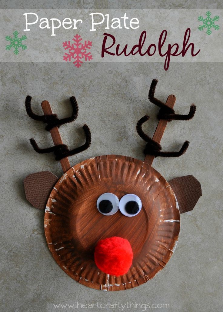 the paper plate reindeer is made to look like it has eyes and nose on it