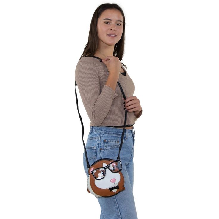 Quality vinyl material and uniquely designed Includes 24" detachable shoulder strap drop Secure zipper closure; 1 exterior pocket. fabric lined interior with 2 slip pockets. Measures approx: 8" (l) x 2" (w) x 7.5" (h) Pig Bag, Nut House, Flying Pig, Guinea Pig, Guinea Pigs, White And Black, Shoulder Strap, Two By Two, Exterior