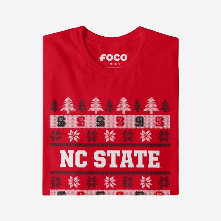 Holiday sweater or t-shirt? Holiday sweater? Or t-shirt? Holiday sweater AND t-shirt. The best of both worlds is the best way to combine your team spirit and holiday spirit. When you put on this NC State Wolfpack Holiday Sweater T-Shirt, get ready to witness all your fellow fans at the office holiday party or family gathering bow to your festive fandom when they get a load of this one. This top features a design that showcases your all-important team colors and a bold team logo display across th Calendar Reminder, Nc State Wolfpack, Office Holiday Party, Logo Display, Nc State, Office Holiday, Wolf Pack, Holiday Sweater, Team Shirts