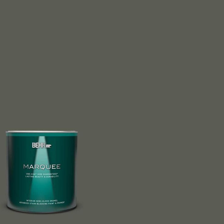 a can of marquee paint on a dark brown background with the words marquee