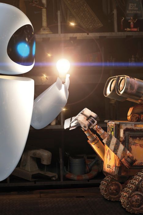 a robot is holding a flashlight in his hand