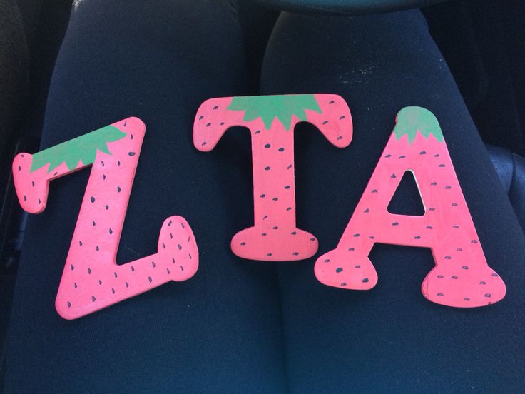 the letters are made out of plastic and sit in the back seat of a car