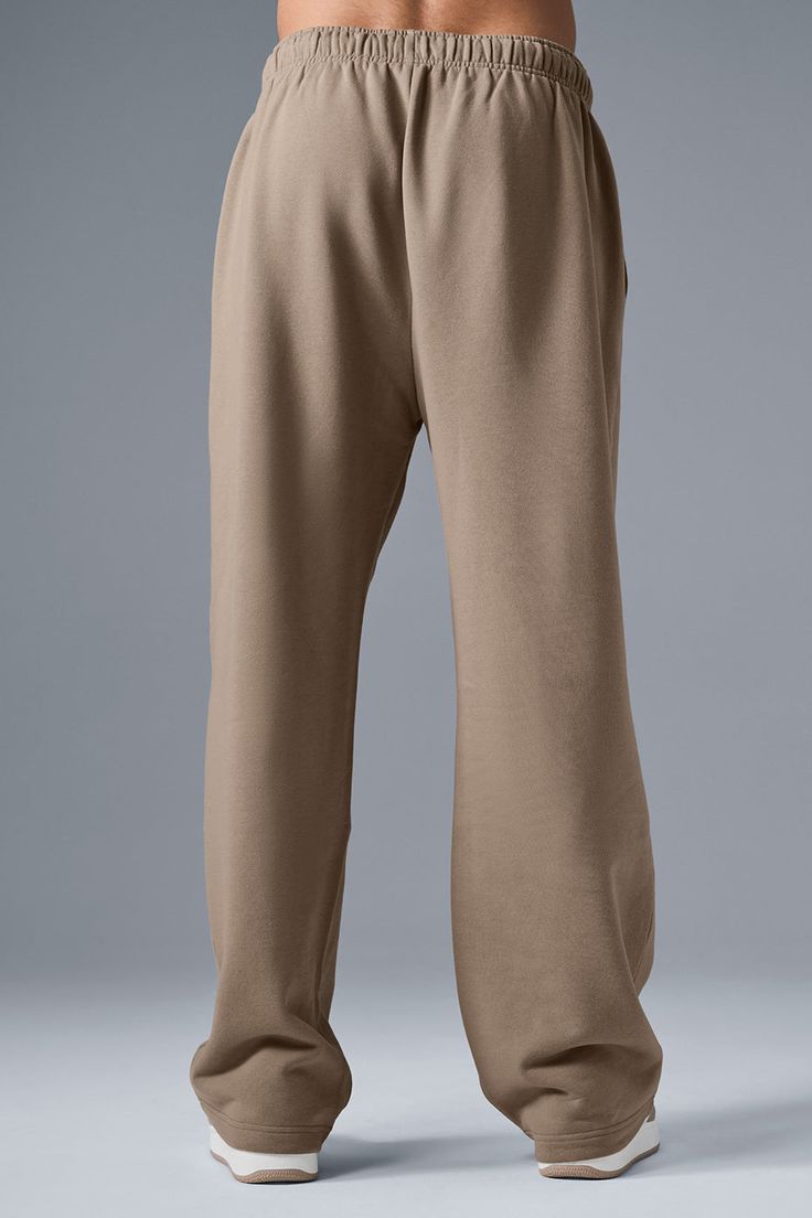 Okay, so we’re pretty much obsessed with this new, straight-leg version of the Accolade Sweatpant — it’s a super soft, leveled-up classic with a chrome Alo logo detail and powerful, performance tech for studio & street. Wear it in cold weather with a bold jacket and transition to warmer weather with slides. Classic Straight Leg Sweatpants With Elastic Waistband, Classic Pants With Straight Hem For Loungewear, Classic Straight Hem Pants For Loungewear, Alo Yoga Relaxed Fit Wide Leg Bottoms, Classic Straight Hem Loungewear Bottoms, Alo Yoga Wide Leg Pants With Elastic Waistband, Alo Yoga Solid Color Pants With Pockets, Alo Yoga Solid Pants With Pockets, Classic Straight Pants For Loungewear