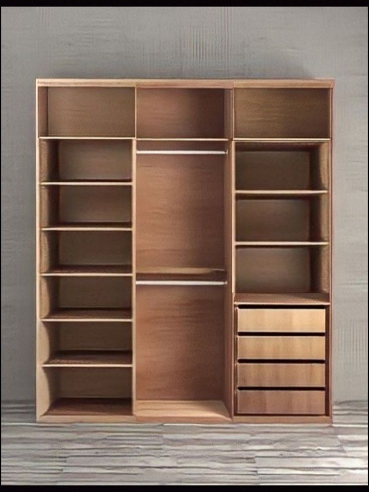 an empty wooden closet with drawers and shelves