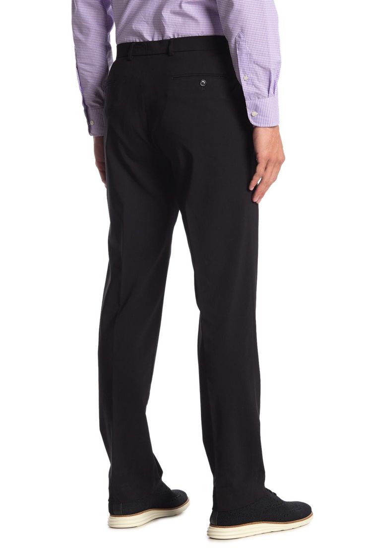 Fit: this style fits true to size. Zip fly with hook-and-bar and button closure. Front slash pockets; back besom pockets. Solid black. Light stretch. Approx. 10.5" rise (size 34x32). Imported Black Elastane Business Pants, Black Stretch Dress Pants For Business, Black 4-way Stretch Straight Dress Pants, Black 4-way Stretch Dress Pants, Tailored Black Work Pants For Business Casual, Black Slim Fit Work Pants For Formal Occasions, Tailored Black Elastane Dress Pants, Black Tailored Elastane Dress Pants, Formal Stretch Ankle-length Work Pants