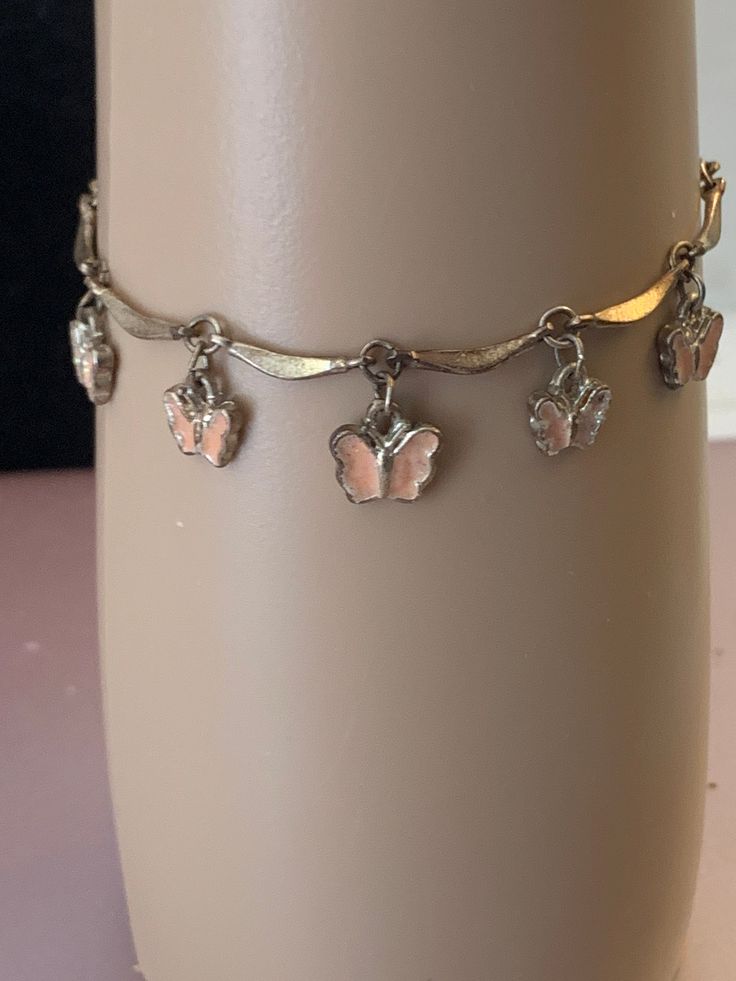 Pink butterflies bracelet Silver Bracelet With Butterfly Clasp, Silver Bracelet With Butterfly Clasp For Gift, Silver Dainty Butterfly Bracelets, Dainty Silver Butterfly Bracelets, Pink Metal Jewelry With Butterfly Charm, Adjustable Silver Jewelry With Butterfly Clasp, Pink Butterfly Charm Bracelet Jewelry, Pink Butterfly Charm Bracelet, Silver Butterfly Bracelets For Gifts