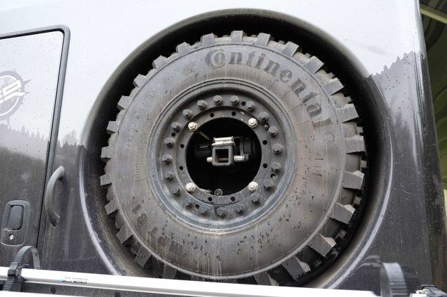 the front tire of a large truck