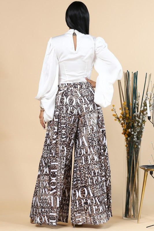 Vogue with animal print, low waist zipper, pockets women palazzo pants. Side Pockets Side Zipper Pleated Front Very Light Stretch Wide Legs Rise: 13" Approx. Inseam: 30.5" Approx. Fabric: 95% Poly / 5% Spandex PANTS ONLY - TOP IS NOT INCLUDED Made in USA Model is wearing a size Small, Model: 5'8" 34-24-36. *Product color as seen on a monitor may vary slightly compared to actual items due to photography lighting conditions and individual screen color calibration. Please see the size chart for inf Festive Luxury Palazzo Set With Set-in Sleeves, Luxury Embellished Palazzo Set For Women, Luxury Palazzo Set With Cutdana For Transitional Season, Luxury Georgette Palazzo Set For Formal Occasions, Luxury Festive Straight Palazzo Set, Luxury Floor-length Palazzo Set For Party, Luxury Palazzo Set For Women, Luxury Elegant Palazzo Set With Unstitched Blouse, Luxury Festive Palazzo Set With Printed Border