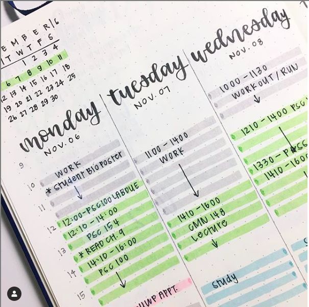 an open planner with the words monday, tuesday and friday written on it in black ink