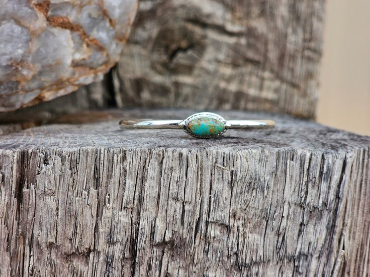 Enhance your baby's style with our Marquise Turquoise Baby Bracelet. Available in both blue and green turquoise, this unisex bracelet adds a touch of elegance and uniqueness to any outfit. Perfect for any occasion, give your little one the gift of timeless beauty and effortless charm. Adjustable Turquoise Cuff Bracelet As Gift, Handmade Adjustable Green Turquoise Ring, Adjustable Green Turquoise Ring, Spiritual Style, Adjustable Green Turquoise Ring In Spiritual Style, Spiritual Turquoise Bangle As Gift, Adjustable Turquoise Bracelet With Birthstone, Adjustable Turquoise Birthstone Jewelry, Adjustable Turquoise Bangle As A Gift, Turquoise Birthstone Bracelet