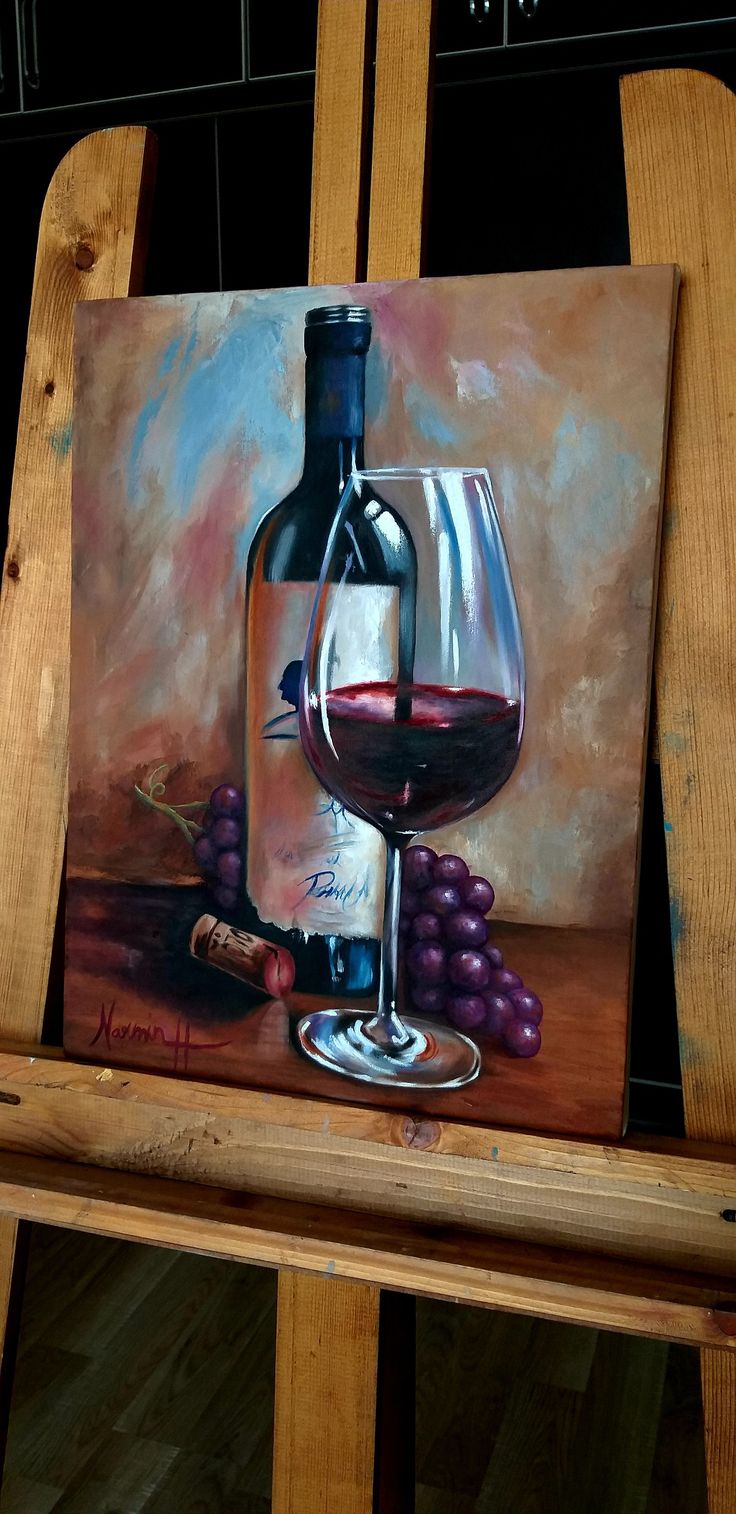 a painting of a wine glass and bottle sitting on a wooden chair next to some grapes