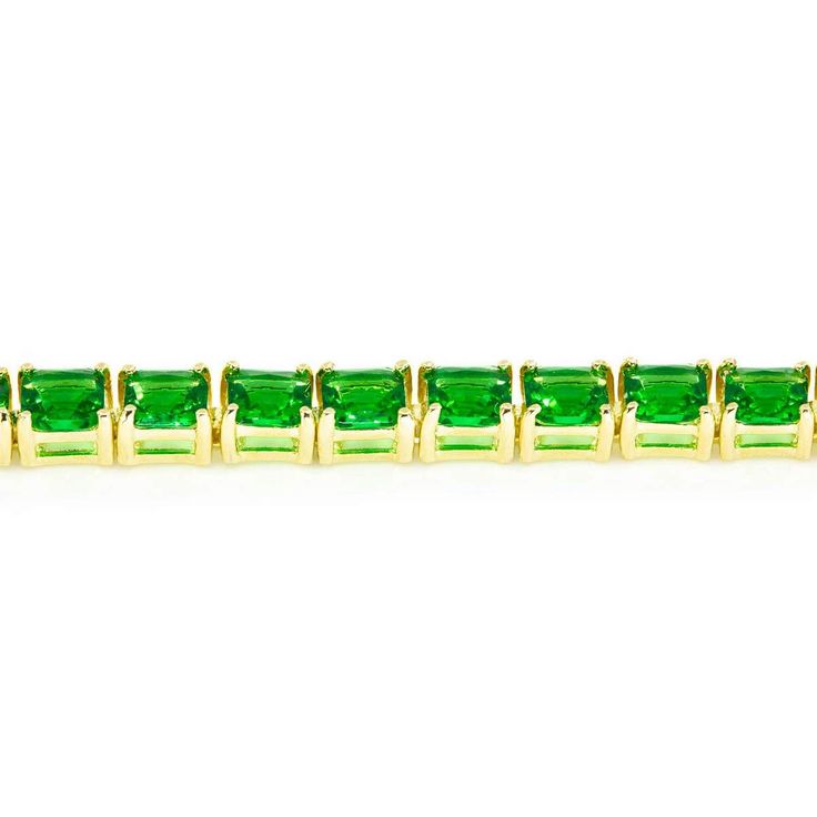 Don't be green with envy... add this gorgeous green tennis bracelet to your daily wrist line up. 14k gold plated sterling silver Square emerald crystals 7.25" in length Formal Green Emerald Cut Tennis Bracelet, Formal Green Emerald-cut Tennis Bracelet, Emerald Cut Green Tennis Bracelet For Formal Events, Emerald-cut Green Tennis Bracelet For Formal Occasions, Formal Green Cubic Zirconia Tennis Bracelet, Green Cubic Zirconia Tennis Bracelet For Formal Occasions, Classic Gold Tennis Bracelet With Emeralds, Green Prong Setting Bracelet, Classic Green May Birthstone Bracelets