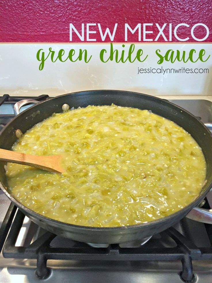 a pan filled with green chile sauce on top of a stove