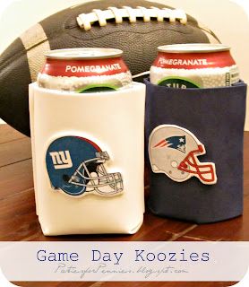 two can coolers with new york giants and football helmets on them sitting on a table