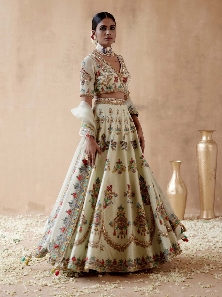 Aman Takyar | Mint Green Dupion Silk Lehenga Set | INDIASPOPUP.COM Green Embroidered Tissue Silk Sets, Tissue Silk Sets With Floral Embroidery For Reception, Green Floral Embroidery Raw Silk Sets, Silk Anarkali Set With Floral Embroidery For Festive Occasion, Festive Silk Anarkali Set With Floral Embroidery, Green Raw Silk Sets With Floral Embroidery, Green Raw Silk Anarkali Set With Floral Embroidery, Floor-length Floral Embroidered Raw Silk Sharara, Floor-length Raw Silk Anarkali Set With Floral Embroidery