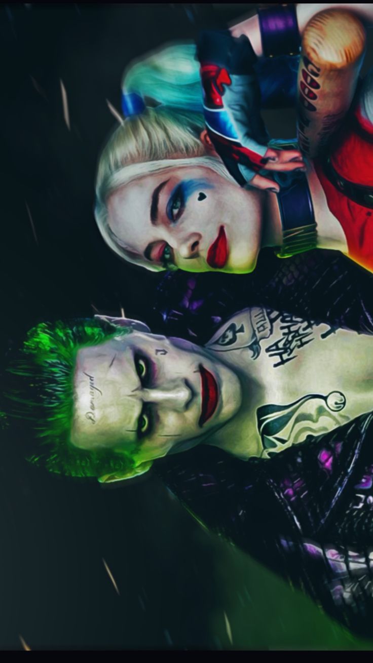 two people dressed as the joker and harley