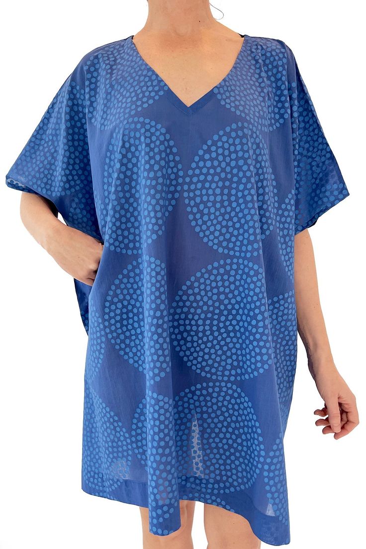 Beach-ready and oh so stylish! This lightweight cotton caftan is perfect for any breezy pool or beach day. Make a statement with the bright colors and patterned details that this short caftan offers. Slip it on and enjoy a day of relaxation and comfort. It can be worn on its own or over jeans or leggings. The one size is very generous and works on lots of body types. It is 100% cotton voile and falls just below the knee. Machine washable. Size Chart: A= 37.5" (Chest) B= 14" (Shoulder) C= 35.25" Cotton Kaftan For Beach Cover-up With Relaxed Fit, Patterned V-neck Beach Kaftan, Beach Viscose V-neck Kaftan, Vibrant Print V-neck Kaftan For Beachwear, Printed V-neck Kaftan Beachwear, Cotton Caftan, Beach Ready, Cotton Voile, Body Types