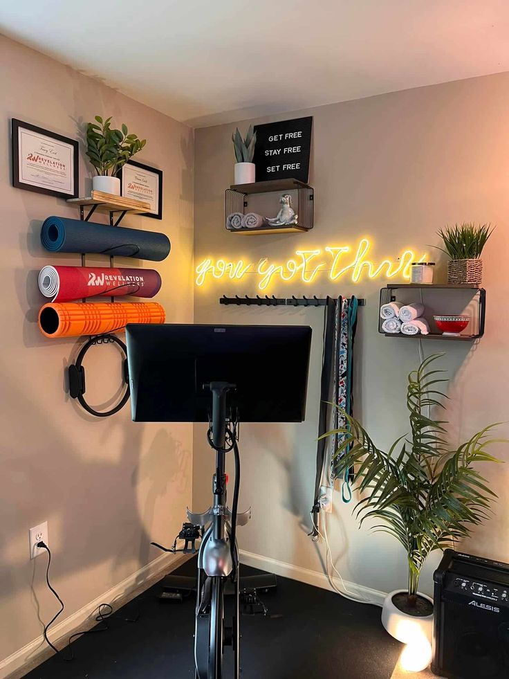 a room with various items on the wall and a neon sign that says what to do