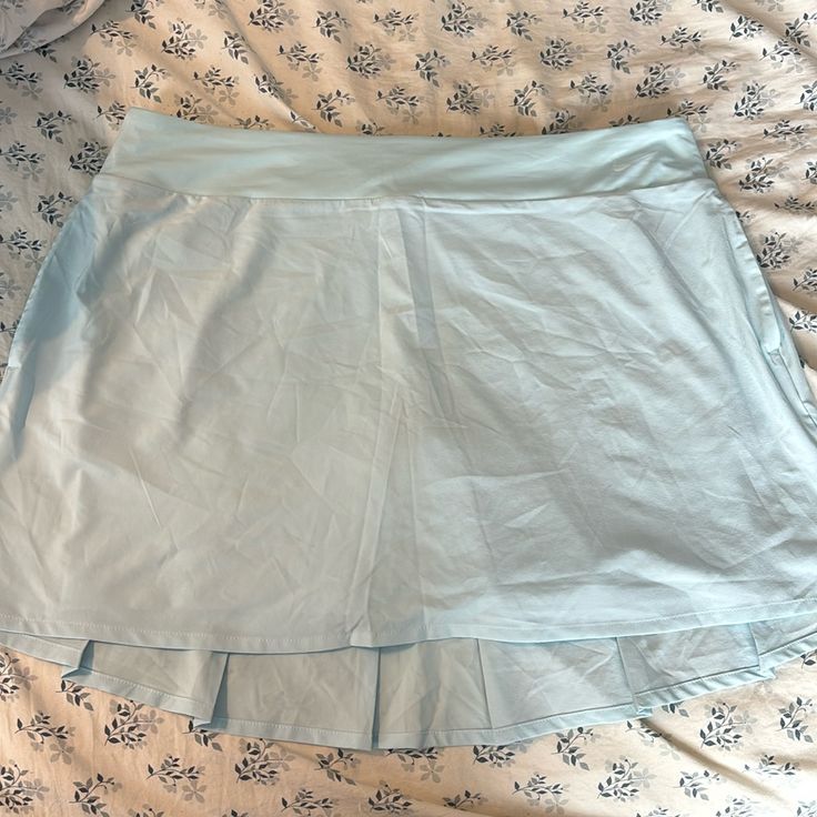 Nike Tennis Skirt Size Xl Never Worn Before Pockets On The Sides Zipper Pocket On The Back Built In Bike Shorts Back Is Slightly Longer Than The Front Small Stain On The Right Side (Picture Included) Measurements: ~ 19 Inches In The Waist L ~ 6 Inch Inseam ~ 16 Inches Top To Bottom In The Front ~ 19 Inches Top To Bottom In The Back Nike Stretch Short Skort, Nike Casual Short Tennis Skirt, Nike Casual Tennis Skirt, Nike Skirted Bottoms For Summer, Nike Lined Skort For Spring, Nike Lined Skirt For Spring, Nike Casual Skort For Summer, Nike Mini Skort, Casual Nike Skort For Summer