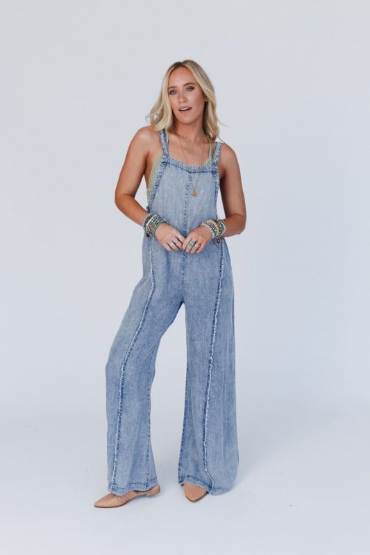 Harley Washed Jumpsuit - Denim Chic Medium Wash Cotton Denim Jumpsuit, Fall Cotton Jumpsuits And Rompers For Loungewear, Cotton Jumpsuits And Rompers For Fall Loungewear, Trendy Relaxed Fit Denim Jumpsuit For Day Out, Spring Cotton Jumpsuits And Rompers For Loungewear, Relaxed Fit Overalls For A Day Out, Chic Light Wash Cotton Jumpsuits And Rompers, Light Wash Relaxed Denim Jumpsuit For Day Out, Chic Dark Wash Overall Jumpsuits And Rompers