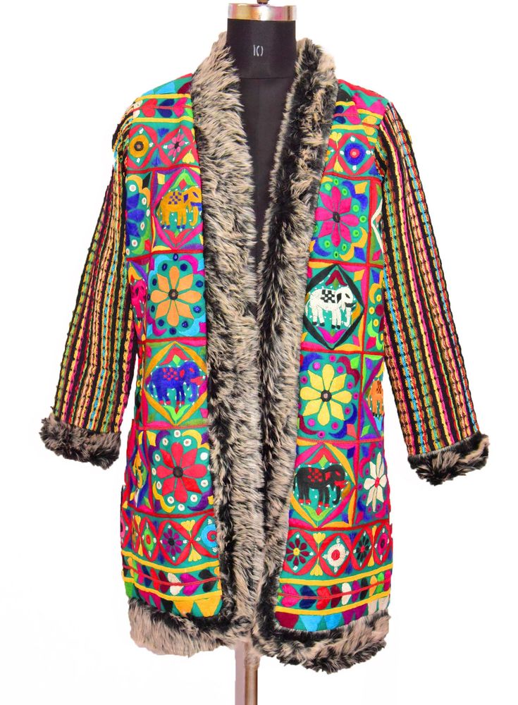 "Item Description Banjara White & Black Outlet Faux Fur Music Festival Look Open Jacket,Gujarat Embroidered Work Jacket, Tribal Coat Tribal banjara vintage handmade fabric created by the ancient nomadic tribes of india; upcycled into a beautiful mirror embellished long coat. Measurements: Jacket Size Type: Regular Jacket Size (Women's): M Decade: 1990s Open Jacket Jacket Bust/Chest Size - \"48\" Inches Jacket Length - \"36\" Inches Jacket Shoulder to Shoulder: Size - \"17\" Inches Jacket Sho Traditional Multicolor Festival Outerwear, Multicolor Long Sleeve Outerwear For Festivals, Festival Long Sleeve Multicolor Outerwear, Multicolor Long Sleeve Festival Outerwear, Long Coat For Festival, Traditional Multicolor Outerwear For Fall, Fitted Folk Outerwear With Multicolor Embroidery, Fitted Folk Outerwear For Fall, Folk Style Fitted Fall Outerwear