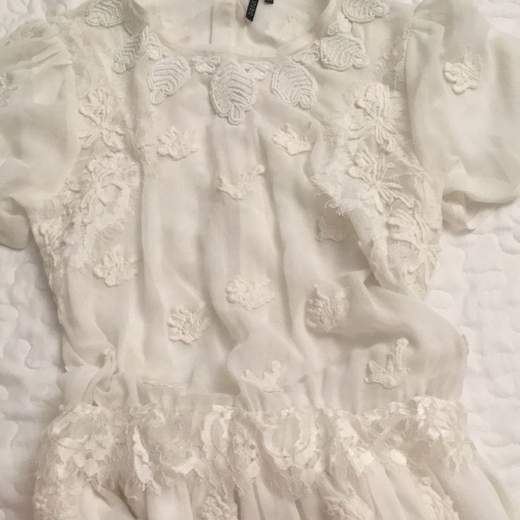 Lovely Ivory Mini Dress With Delicate Embroidery, Beads, And Lace. Purchased In Holland From Exclusive St Studio Boutique. European Size 34 (Usa 2). Never Worn. Delicate White Party Dress, White Summer Dress With Pearl Embroidery, Summer White Dress With Pearl Embroidery, White Embroidered Lace Party Dress, White Embroidered Lace Dress With Short Sleeves, White Embellished Short Sleeve Dresses, White Embroidered Lace Dress For Party, White Floral Embroidery Lace Dress For Formal Occasions, White Lace Dress With Floral Embroidery For Formal Occasions