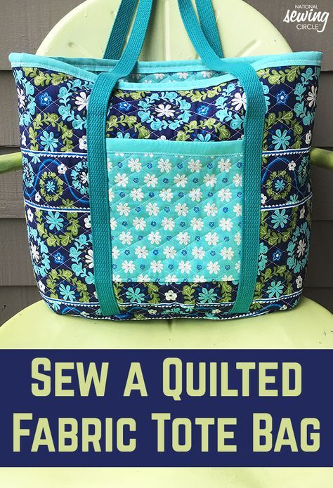 the sew a quilted fabric tote bag is sitting on top of a chair