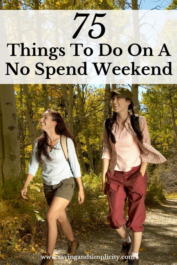 two girls walking down a trail with the text 75 things to do on a no spend weekend