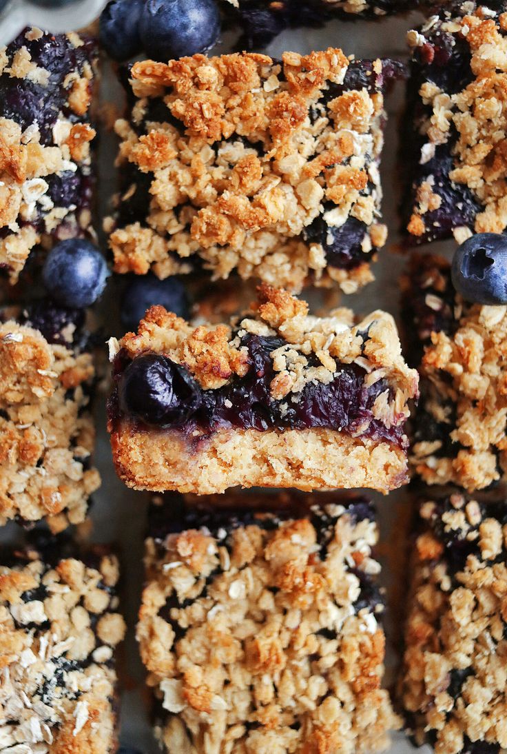 blueberry oatmeal bars stacked on top of each other