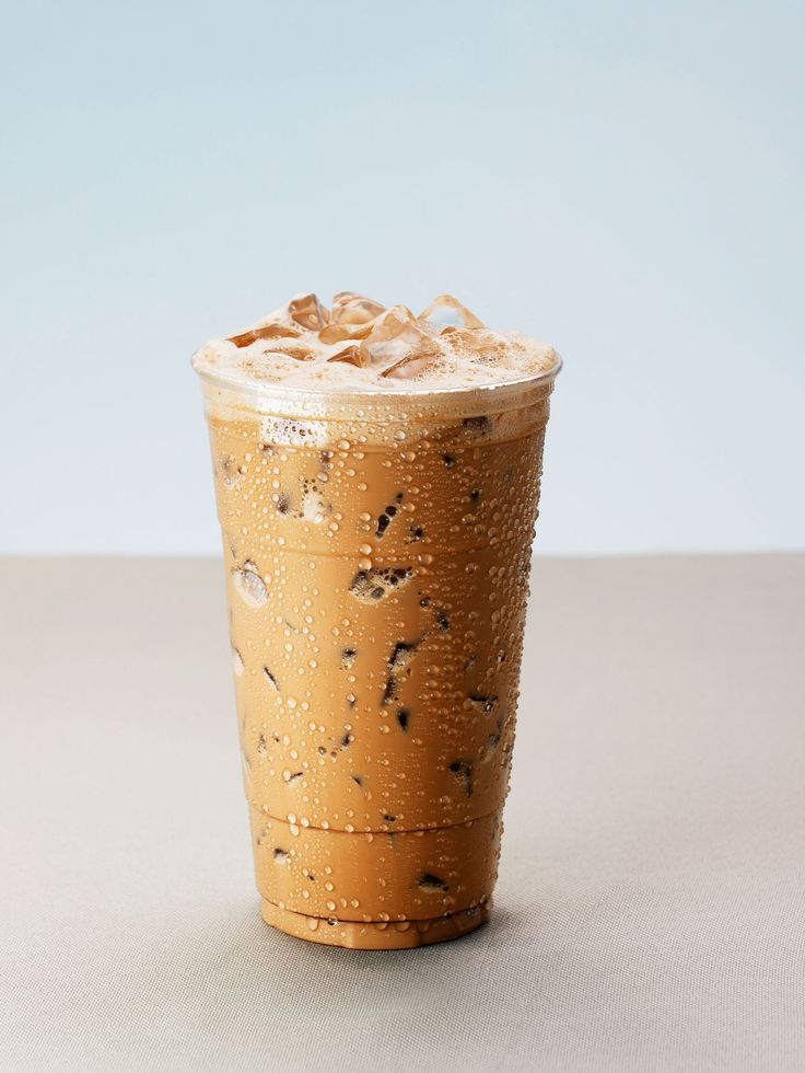 an iced drink with chocolate chips on top