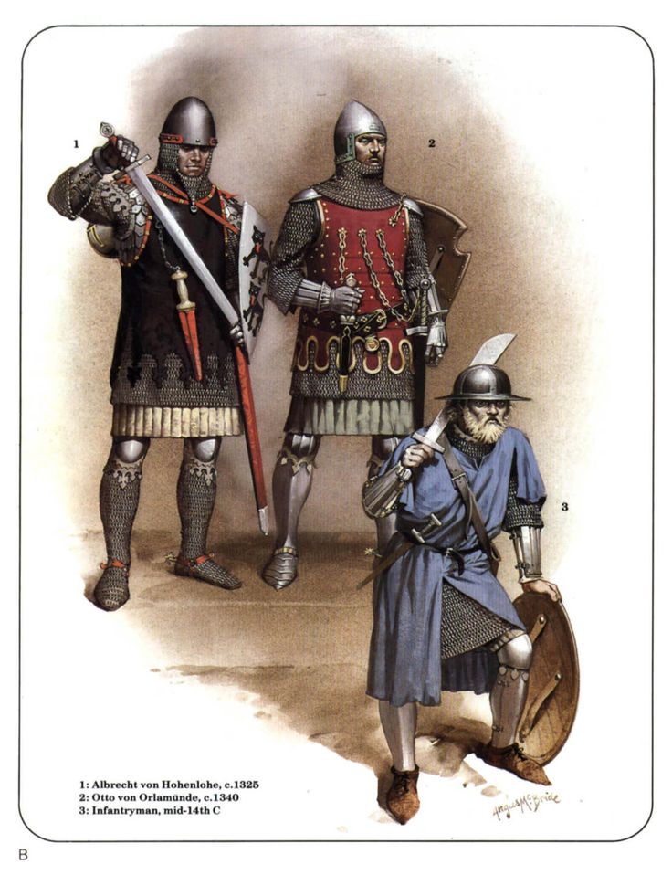 three men in armor standing next to each other