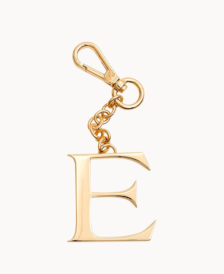 Personalize It    Customize your handbag, keychain, and more with a monogram charm made from jewelry-grade hardware with a special 24k gold coating that protects from signs of wear. Gold Logo Charm Bag Charm, Luxury Gold Bag Charm As Gift, Luxury Everyday Jewelry With Logo Charm, Elegant Keychain With Key Clip For Gift, Gold Keychain Bag Charm For Everyday Use, Gold Bag Charm With Logo For Everyday Use, Gold Keychain With Logo Charm As Gift, Gold Bag Charm With Logo, Gold Jewelry With Metal Logo For Gifts