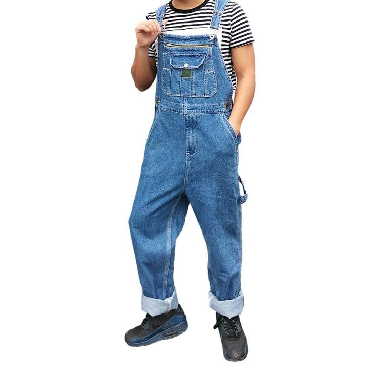 Bring back the 90s with our unrubbed men's denim dungaree from the 2023 Spring-Summer Collection ââ‚?an iconic piece that'll make you stand out in every crowd!Why You'll Love ItThis dungaree is designed to keep you stylish. comfortable. and on-style. Its medium wash and loose fit provide a timeless look and fit type that you can rock day or night. Plus. the suspenders & buttons closure. intricately painted prints. and sanded finish all come together to make this an unforgettable piece.Unmissable Medium Wash Cotton Shortalls With Straight Leg, Medium Wash Cotton Straight Leg Shortalls, Casual Cotton Shortalls With Straight Leg, Denim Blue Cotton Shortalls With Relaxed Fit, Casual Denim Straight Leg Shortalls, Casual Denim Shortalls With Straight Leg, Blue Straight Leg Overalls For Streetwear, Medium Wash Cotton Overalls, Washed Blue Cotton Overall Jeans