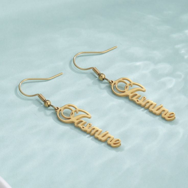 Create the perfect accessory with these unique, personalized earrings. Featuring three stylish designs in gold and silver colors, these high quality metal alloy earrings come engraved with your name for a truly special accessory. Enjoy the feel of quality you get with custom-made name earrings. Font Number, Name Earrings, Alloy Earrings, Popular Jewelry, Monogram Necklace, Custom Earrings, Stainless Steel Earrings, Minimalist Earrings, Pendant Earrings