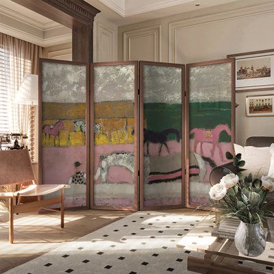 a room divider in the middle of a living room filled with furniture and flowers