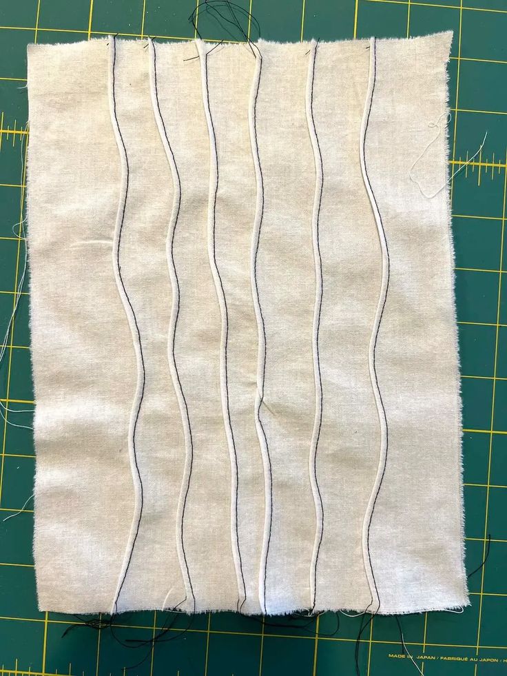 a piece of fabric with lines drawn on it